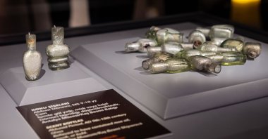 Antique glass perfume bottles retrieved from a 1,100-year-old shipwreck on the coast of Kaş, Antalya, western Türkiye, Aug. 8, 2025. (AA Photo)