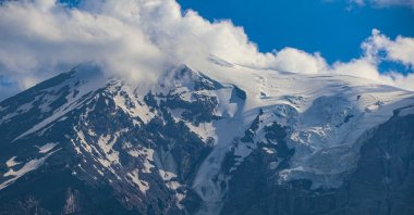 The snow-covered peak of Mount Ağrı, Türkiye’s highest mountain, surrounded by shrinking glaciers, Ağrı, Türkiye, Aug. 9, 2025. (AA Photos)