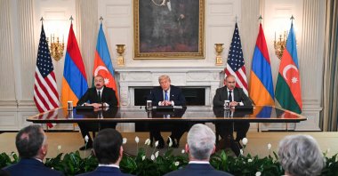Donald Trump (C), Azerbaijan&#039;s Ilham Aliyev (L), and Armenia&#039;s Nikol Pashinyan participate in a trilateral agreement signing in Washington, D.C., Aug. 8, 2025. (AFP Photo)