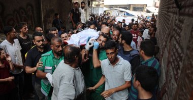 Mourners carry the body of Al Jazeera correspondent Anas al-Sharif, who was killed alongside other journalists in an overnight Israeli strike on their tent, Gaza City, Palestine, Aug. 11, 2025. (AFP Photo)