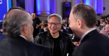Nvidia CEO Jensen Huang (C), U.S. Commerce Secretary Howard Lutnick (L) and Environmental Protection Agency (EPA) administrator Lee Zeldin attend the "Winning the AI Race" Summit, Washington, U.S., July 23, 2025. (Reuters Photo)