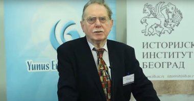 A still shot from a Yunus Emre Institute (YEE) video showing Machiel Kiel delivering a speech.