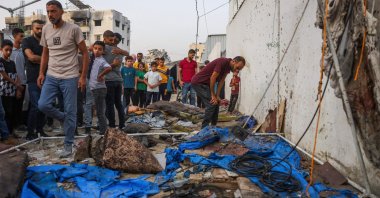 Palestinians check the destroyed Al Jazeera tent at Al-Shifa Hospital following an overnight strike by Israel that killed five journalists, Gaza City, Palestine, Aug. 11, 2025. (AFP Photo)