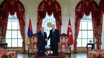 President Recep Tayyip Erdoğan (R) shakes hands with Armenian Prime Minister Nikol Pashinyan at the Presidential Complex, Ankara, Türkiye.