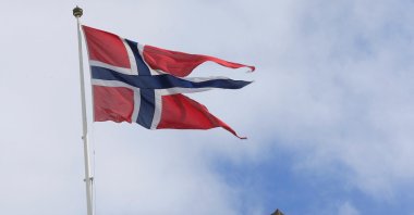 A Norwegian flag flutters over a building in Oslo, Norway, May 31, 2017. (Reuters Photo)