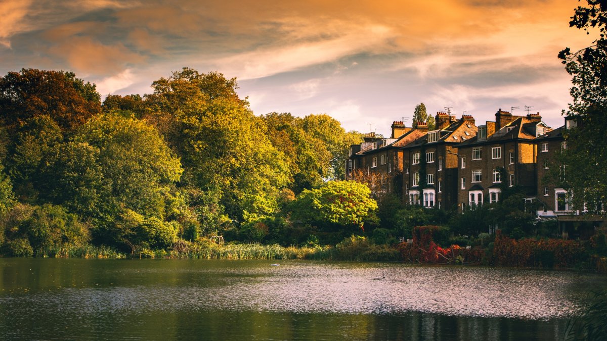 A scenic view of the lake at sunset, Hampstead Heath, London, U.K. (Getty Images)