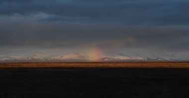 A rainbow is seen over the permafrost in the town of Quinhagak on the Yukon Delta, Alaska, U.S., April 12, 2019. (AFP Photo)