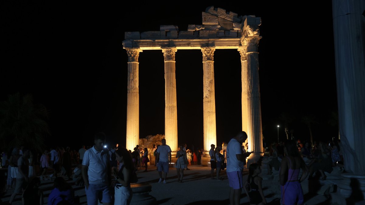 Visitors explore the ancienty city of Side during the nighttime museum experience, Antalya, southern Türkiye, Aug. 5, 2025. (AA Photo)