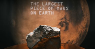 The 54-pound Martian meteorite NWA 16788, the largest known piece of Mars ever discovered on Earth, is displayed during a Sotheby’s auction preview, New York, U.S., July 15, 2025. (AFP Photo)