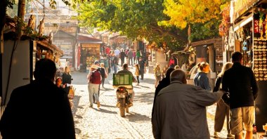 People walk through the hillside village of Şirince, a popular tourist spot in Izmir province, western Türkiye, Jan. 5, 2023. (Shutterstock Photo)