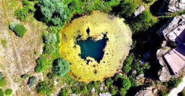 A drone-captured aerial view shows the Dipsizgöl lake, Sivas, eastern Türkiye, Aug. 13, 2025. (IHA Photo)