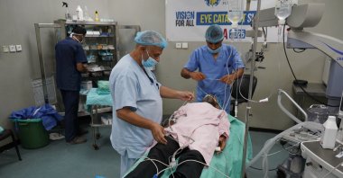 Doctors perform a surgery at the Eye Hospital, Gaza City, Palestine, Aug. 9, 2025. (AA Photo)