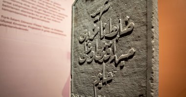 A tombstone is displayed at the &quot;Golden Age of Archaeology&quot; exhibition, Ankara, Türkiye, Aug. 8, 2025. (AA Photo)