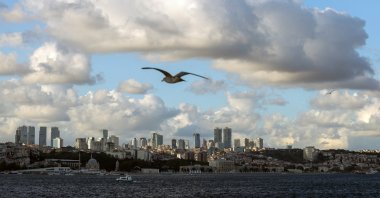 Clouds gather over the Bosporus, with residential buildings and skyscrapers in the background, Istanbul, Türkiye, July 31, 2025. (Reuters Photo)