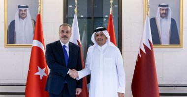 Foreign Minister Hakan Fidan shakes hands with his Qatari counterpart, Mohammed bin Abdulrahman Al Thani, in Doha, Qatar, Wednesday, Aug. 13, 2025. (AA Photo)