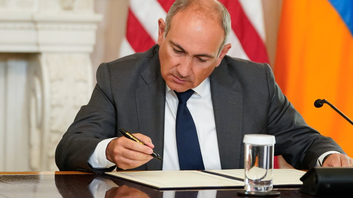 Armenian Prime Minister Nikol Pashinyan attends the signing ceremony during the peace summit with Azerbaijan in the State Dining Room of the White House, Washington, U.S., Aug. 8, 2025. (EPA Photo)