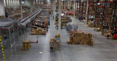  People work at the Polish marketplace Allegro distribution center, ahead of Christmas, in Adamow, Poland, Dec. 11, 2024. (Reuters Photo)