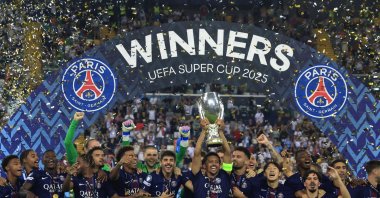 Paris Saint-Germain players celebrate after beating Tottenham Hotspur to win the UEFA Super Cup at the Bluenergy Stadium, Udine, Italy, Aug. 13, 2025. (AA Photo)