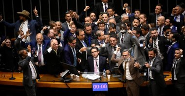 President of the Chamber of Deputies Hugo Motta sits in his chair after the end of a protest by allies of former president Jair Bolsonaro that blocked the resumption of sessions after the mid-year recess in protest against the house arrest of Bolsonaro, at the Chamber of Deputies, Brasilia, Brazil, Aug. 6, 2025. (Reuters Photo)