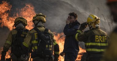 Firefighters try to control the flames during a forest fire in Monterrei, Ourense, Galicia, Spain, Aug. 13, 2025. (EPA Photo)