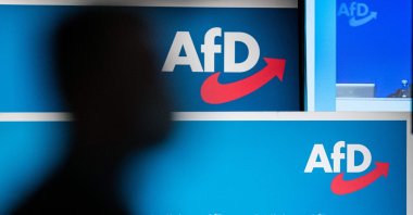 The logo of Germany&#039;s far-right Alternative for Germany (AfD) party during a congress in Dresden, eastern Germany, April 11, 2021. (AFP File Photo)