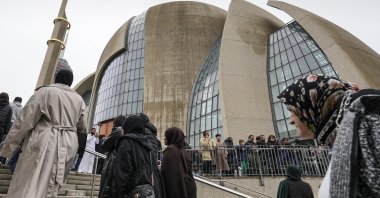 Muslims walk to the Cologne Central Mosque in Cologne, Germany, Friday, Oct. 14, 2022. (AP File Photo)