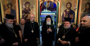 Latin Patriarch of Jerusalem Archbishop Pierbattista Pizzaballa, Greek Orthodox Patriarch of Jerusalem, Theophilos III, Greek Orthodox Patriarchate Archbishop Alexios, and Parish priest Father Gabriele Romanelli, who suffered light leg injuries in an Israeli strike on the Holy Family Church on Thursday, visit the Greek Orthodox Saint Porphyrius Church, in Gaza City July 18, 2025. (Reuters File Photo)