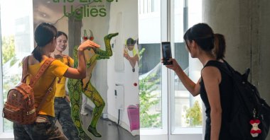 People visit the exhibition &quot;Era of Uglies Has Arrived&quot; by Alibaba&#039;s Taobao, in Hangzhou, Zhejiang province, China, Aug. 13, 2025. (Reuters Photo)