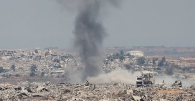Smoke rises from destroyed buildings following an Israeli airstrike inside Gaza, as seen from the Israeli side, near the border with Gaza Strip, in southern Israel, Aug. 12, 2025. (EPA Photo)