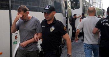 Some 45 suspects in the Istanbul Metropolitan Municipality corruption probe are escorted to court after undergoing medical examinations, Istanbul, Türkiye, Aug. 18, 2025. (AA Photo)
