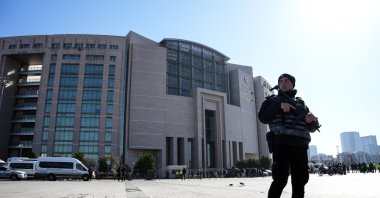 A police officer stands guard outside the Çağlayan courthouse, Istanbul, Türkiye, Feb. 6, 2024. (IHA File Photo)