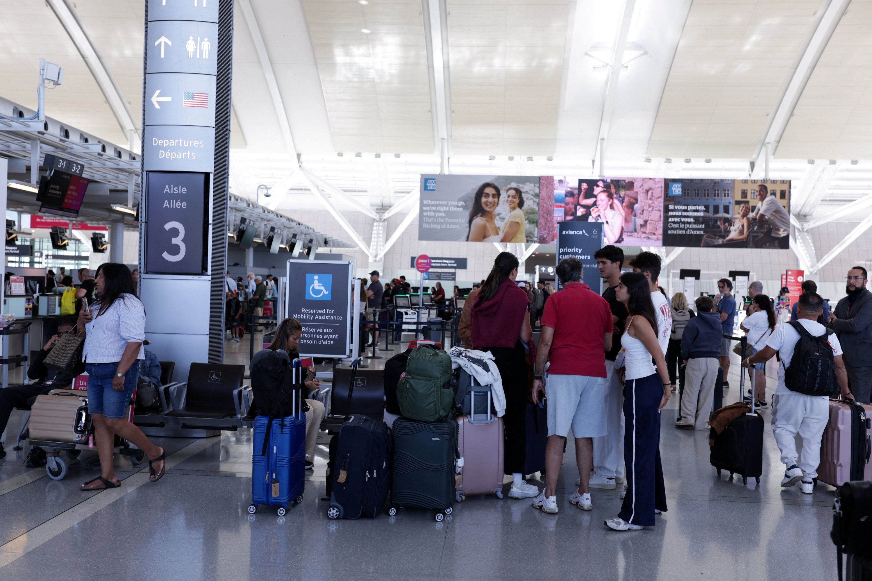 Stranded passengers gather as Air Canada flight attendants strike at Toronto Pearson International Airport in Mississauga, Ontario, Canada, Aug. 18, 2025. (Reuters Photo)