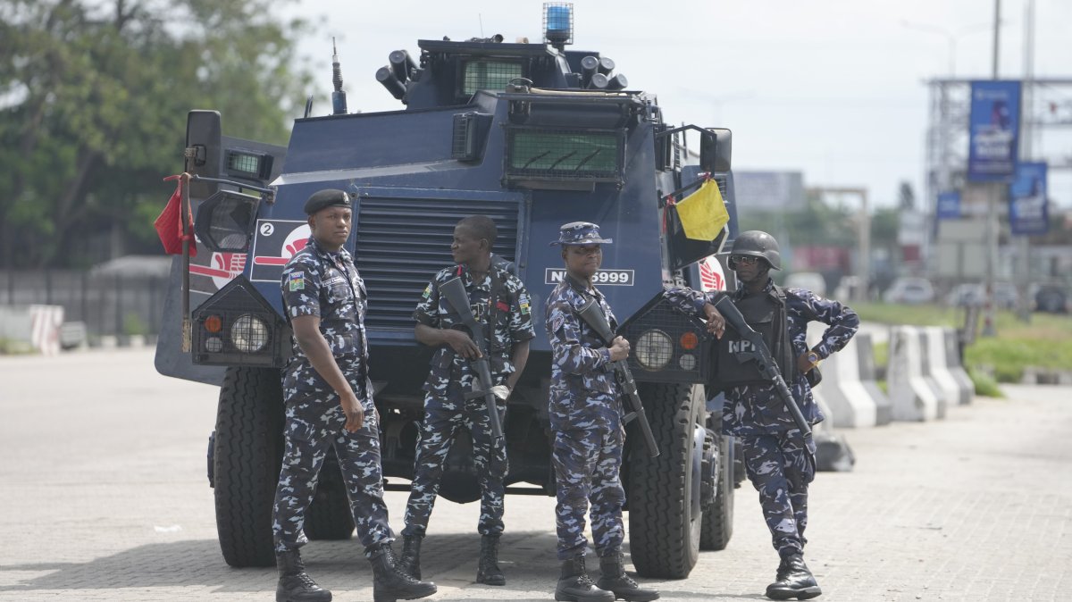 Police officers stand guard following a planned demonstration to remember the victims of the historic protests against police brutality which took place four years ago, at Lekki Toll Plaza in Lagos Nigeria, Sunday, Oct. 20, 2024. (AP File Photo)