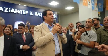 Umut Yılmaz, the mayor of Şehitkamil district, delivers a speech at the AK Party offices after switching from the CHP, Gaziantep, southern Türkiye, Aug. 16, 2025. (İHA Photo)