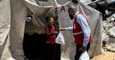 This undated photo from July 2025 shows a Turkish Red Crescent worker delivering aid in Gaza, Palestine. (Courtesy of Turkish Red Crescent) 