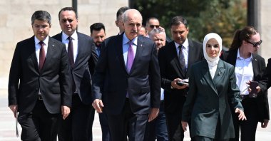 Parliament Speaker Numan Kurtulmuş (2nd L) and Minister of Family and Social Services Mahinur Özdemir Göktaş (R) arrive for the meeting, Ankara, Türkiye, Aug. 19, 2025. (AA Photo)