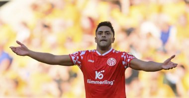Mainz&#039;s Nadiem Amiri celebrates scoring a goal during the German cup in Dresden, Germany, Aug. 18, 2025. (AP Photo)
