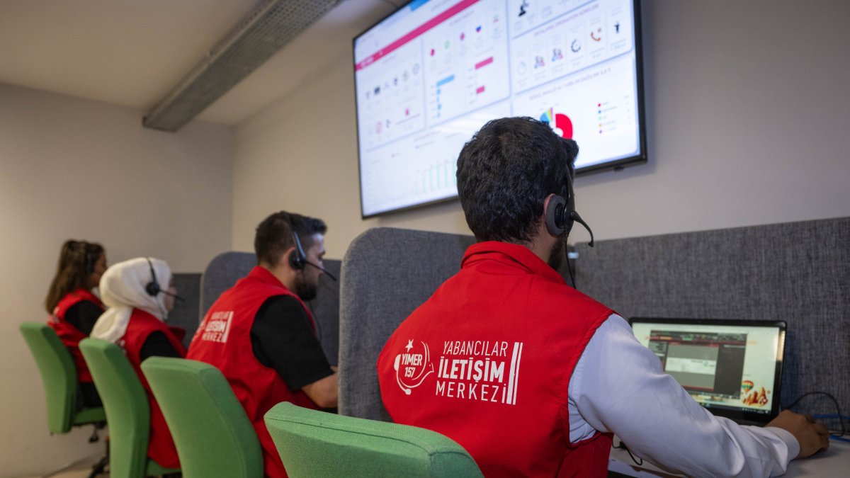 YIMER 157 office staff assists foreigners through multiple communication channels, Ankara, Türkiye, Aug. 19, 2025. (AA Photo)