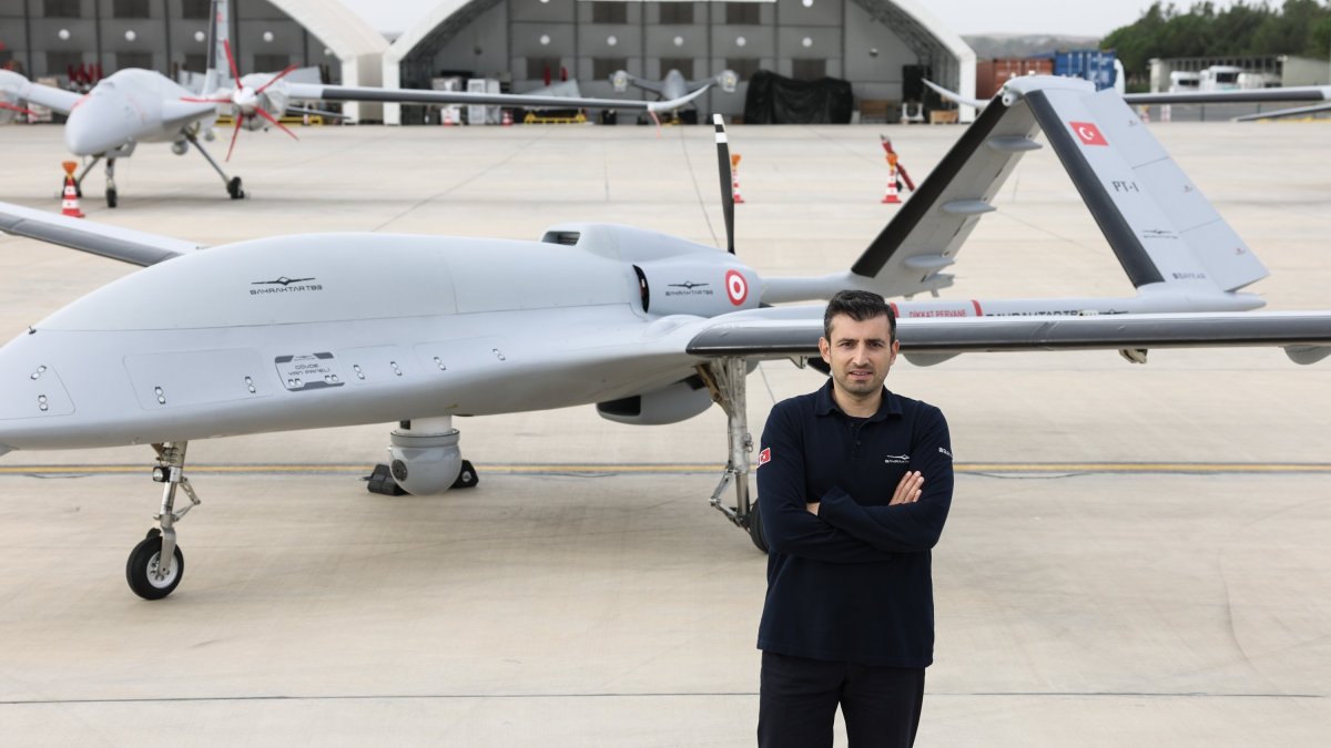 Selçuk Bayraktar, Baykar’s board chair and chief technology officer (CTO), poses for a photo in front of the Bayraktar TB3 drone, Tekirdağ, northwestern Türkiye, Oct. 27, 2023. (IHA Photo)