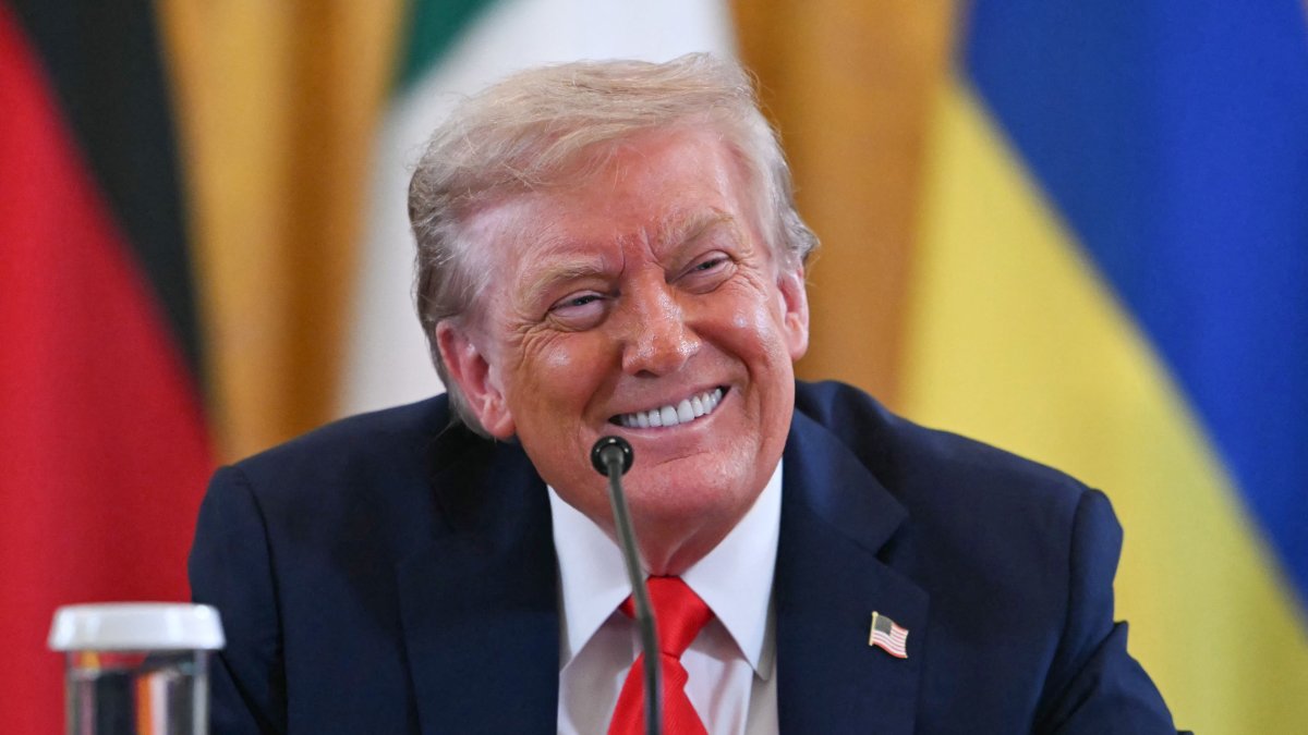 U.S. President Donald Trump smiles during a meeting with Ukrainian President Volodymyr Zelenskyy and European leaders in the East Room of the White House in Washington, D.C., Aug. 18, 2025. (AFP Photo)