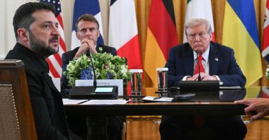 French President Emmanuel Macron (2nd L) and U.S. President Donald Trump (R) listen to Ukrainian President Volodymyr Zelenskyy speak during a meeting with European leaders in the East Room of the White House, Washington, U.S., Aug. 18, 2025. (AFP Photo)