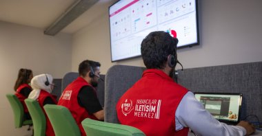YIMER 157 office staff assists foreigners through multiple communication channels, Ankara, Türkiye, Aug. 19, 2025. (AA Photo)
