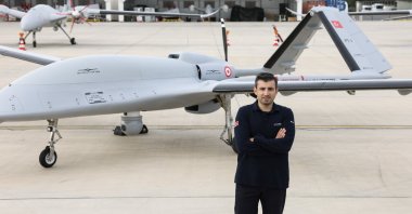 Selçuk Bayraktar, Baykar’s board chair and chief technology officer (CTO), poses for a photo in front of the Bayraktar TB3 drone, Tekirdağ, northwestern Türkiye, Oct. 27, 2023. (IHA Photo)