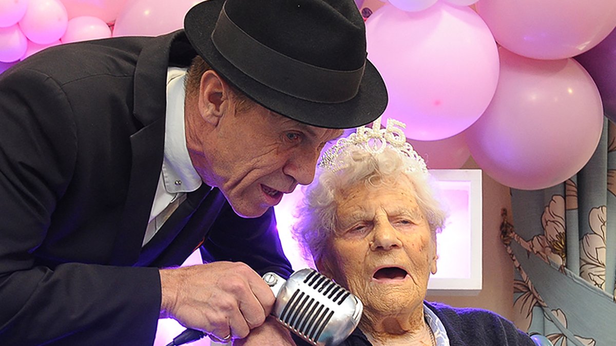 A handout photograph released by Hallmark Care Homes shows Ethel Caterham celebrating her 115th birthday in Lightwater, south west of London, U.K., Aug. 21, 2024. (AFP Photo)