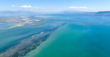 An aerial view of Izmir Bay shows areas affected by pollution and the ecological imbalance, Izmir, Türkiye, Aug. 20, 2025. (DHA Photo)