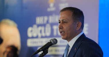 Interior Minister Ali Yerlikaya speaks at an AK Party event in Erzurum, Aug. 21, 2025. (AA Photo)