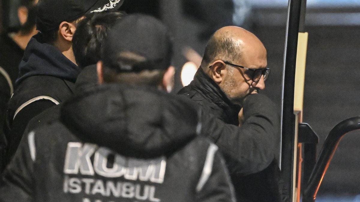 Police escort Aziz İhsan Aktaş after his detention, in Istanbul, Türkiye, Jan. 17, 2025. (AA Photo)