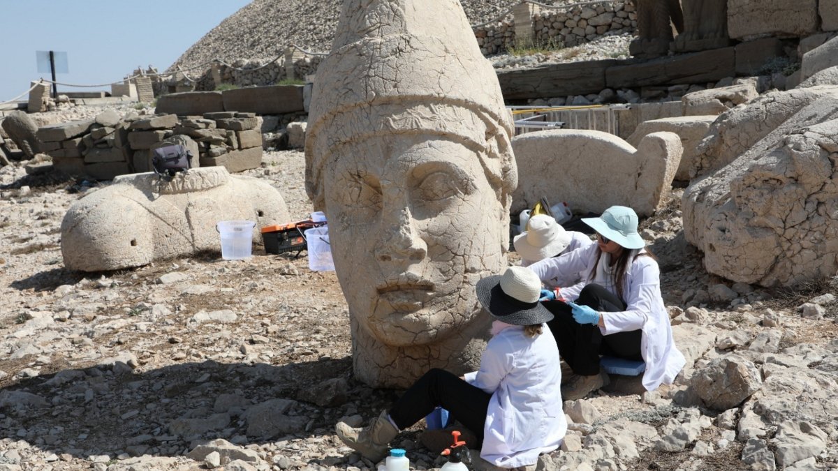 Experts carry out nanotechnology restoration work on a colossal statue at Mount Nemrut, Adıyaman, southeastern Türkiye, Aug. 21, 2025. (AA Photo)