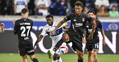 Beşiktaş&#039;s Milot Rashica (R) in action during the UEFA Europa Conference League playoff first leg match against Lausanne at the La Tuiliere Stadium, Lausanne, Switzerland, Aug. 21, 2025. (AA Photo)