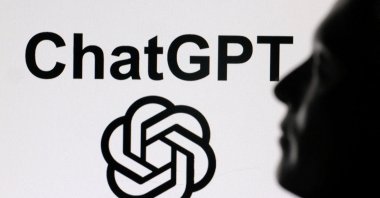 A 3D-printed miniature model of Elon Musk and the ChatGPT logo are seen in this illustration taken Feb. 11, 2025. (Reuters Photo)